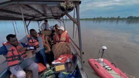 annual-survey-of-ruki-river-uses-adcp-to-help-gather-accurate-discharge-measurements-researchers-on-boat.png